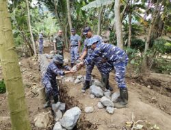 Satgas TMMD 116 Bondowoso Pasang Pondasi Batu Untuk Jalan